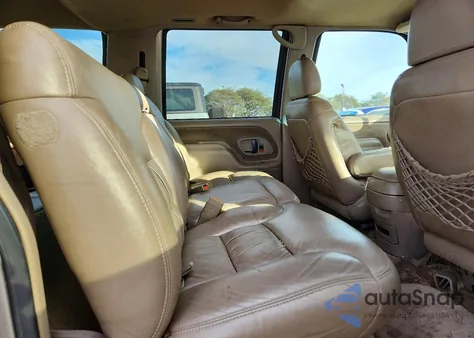 1999 GMC Suburban C1500 из США, поврежденный, VIN 3GKEC16RXXG547666